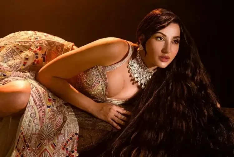Nora Fatehi: Nora Fatehi struck such a pose in a glittering pant-suit, fans  are getting ecstatic